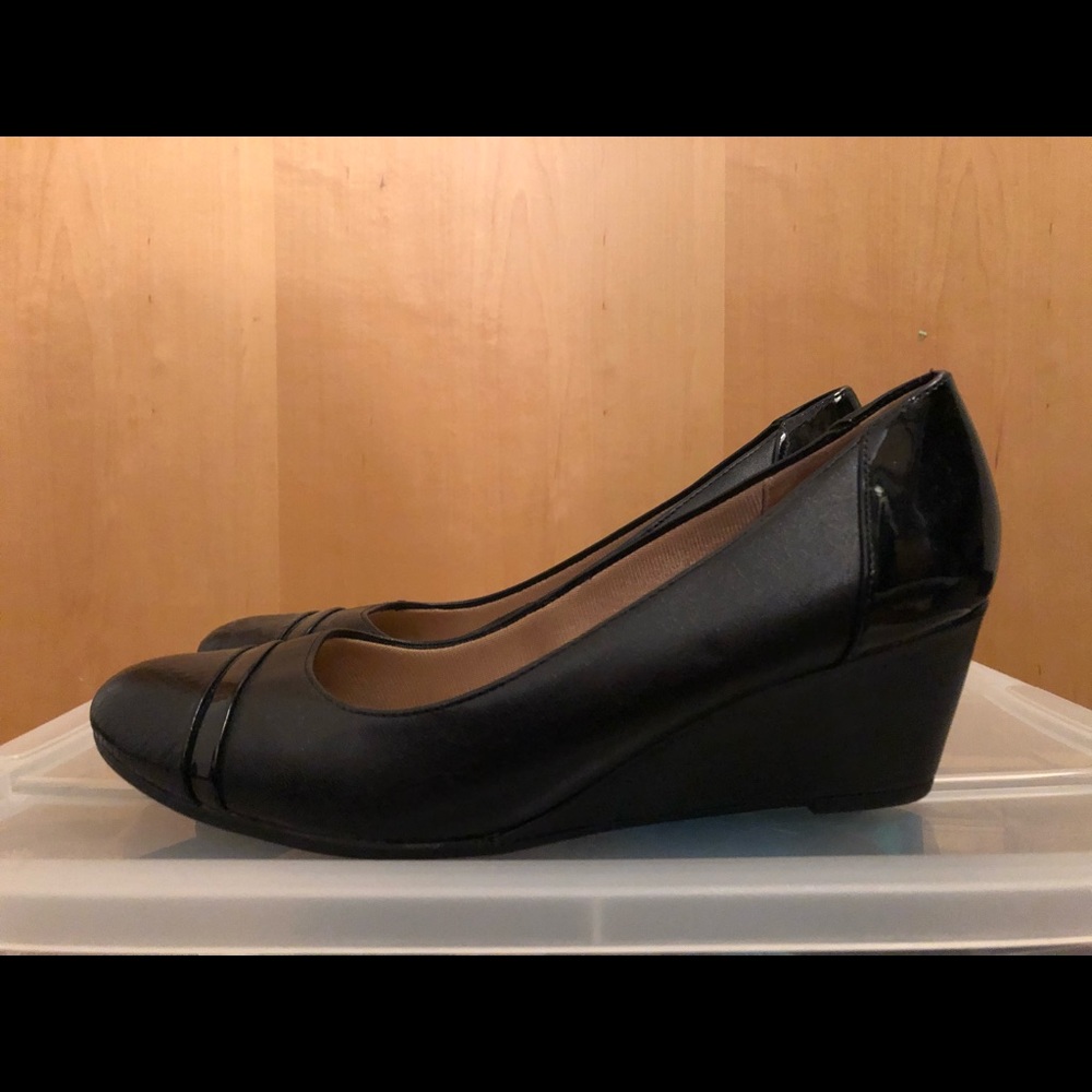 Black patent, flat, and textured leather wedges